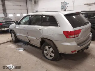 2011 Jeep Grand Cherokee Laredo with VIN 1J4RR4GG5BC690251, listed as a IAAI auction lot 41824839 with 261,010 mi miles. Bid and sale history available at carsss.com. Image 3.