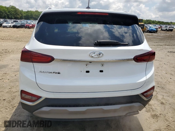 2019 Hyundai Santa Fe SE z VIN 5NMS23AD6KH094877, wystawiony jako Copart lot #58209485 z przebiegiem 77 142 mil mil oraz Szkoda całkowita • Salvage title. Historia ofert i sprzedaży dostępna na DreamBid. Obrazek 6.