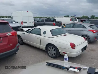2002 Ford Thunderbird w/Hardtop Premium with VIN 1FAHP60A62Y127579, listed as a IAAI auction lot 42035019 with 98,582 mi miles. Bid and sale history available at carsss.com. Image 14.