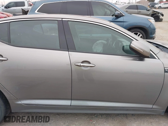 2014 Kia Optima SXL Turbo with VIN 5XXGR4A67EG336118, listed as a IAAI auction lot 41613725 with 121,671 mi miles and . Bid and sale history available at DreamBid. Image 13.
