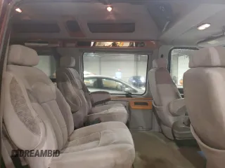 2004 Ford Econoline Cargo Recreational z VIN 1FDRE14W34HA36863, wystawiony jako Copart lot #57751505 z przebiegiem 168 460 mil mil oraz Szkody całkowita. Historia ofert i sprzedaży dostępna na DreamBid. Obrazek 11.