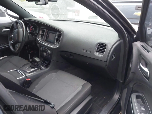2015 Dodge Charger SE with VIN 2C3CDXBG7FH841469, listed as a IAAI auction lot 42001599 with 103,342 mi miles and . Bid and sale history available at DreamBid. Image 5.