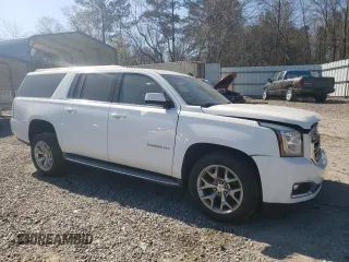 2015 GMC Yukon XL SLT with VIN 1GKS1HKC2FR118409, listed as a Copart auction lot 49601445 with 115,970 mi miles and Salvage Title. Bid and sale history available at carsss.com. Image 4.