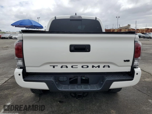 2021 Toyota Tacoma 4WD SR with VIN 3TMCZ5AN5MM431429, listed as a Copart auction lot 48203175 with 22,108 mi miles and Salvage Title. Bid and sale history available at carsss.com. Image 6.