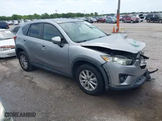 2013 Mazda CX-5 Touring with VIN JM3KE2CE3D0136911, listed as a IAAI auction lot 42095413 with 158,515 mi miles. Bid and sale history available at carsss.com. Image 1.
