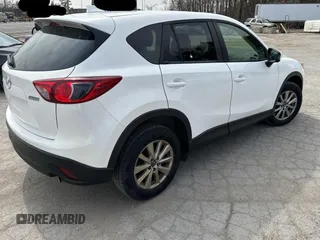 2015 Mazda CX-5 Sport with VIN JM3KE2BE8F0477192, listed as a Copart auction lot 53341745 with 221,042 mi miles and Clean Title. Bid and sale history available at carsss.com. Image 4.