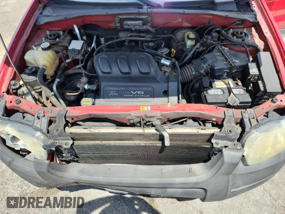 2002 Ford Escape XLT Choice with VIN 1FMYU03132KA78142, listed as a Copart auction lot 65527755 with 149,326 mi miles and Salvage title. Bid and sale history available at DreamBid. Image 11.
