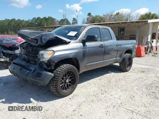 2014 Toyota Tundra 4WD Truck SR with VIN 5TFUM5F11EX055025, listed as a IAAI auction lot 41883017 with 100,565 mi miles. Bid and sale history available at carsss.com. Image 17.