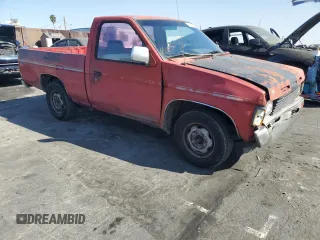 1987 Nissan Hardbody E z VIN JN6ND11S3HW006235, wystawiony jako Copart lot #78528914 z przebiegiem 298 079 mil mil oraz Szkody całkowita. Historia ofert i sprzedaży dostępna na DreamBid. Obrazek 4.