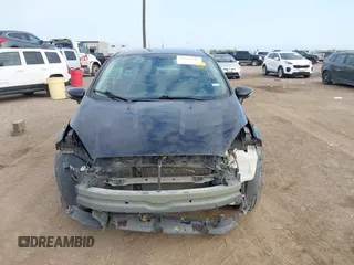 2018 Ford Fiesta SE z VIN 3FADP4BJ0JM139172, wystawiony jako IAAI lot #41212242 z przebiegiem 160 238 mil mil oraz . Historia ofert i sprzedaży dostępna na DreamBid. Obrazek 13.