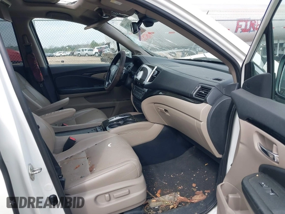 2017 Honda Pilot Elite with VIN 5FNYF6H04HB042192, listed as a IAAI auction lot 41780875 with 158,491 mi miles and . Bid and sale history available at DreamBid. Image 5.