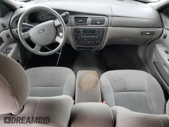 2006 Ford Taurus SE with VIN 1FAHP53U86A237001, listed as a Copart auction lot 62858785 with 133,697 mi miles and Salvage title. Bid and sale history available at DreamBid. Image 8.