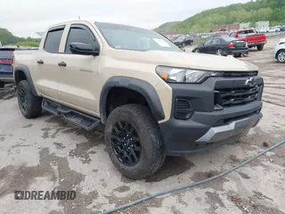 2024 Chevrolet Colorado 4WD Trail Boss with VIN 1GCPTEEK2R1155752, listed as a IAAI auction lot 42211659 with 28,428 mi miles and . Bid and sale history available at DreamBid. Image 1.
