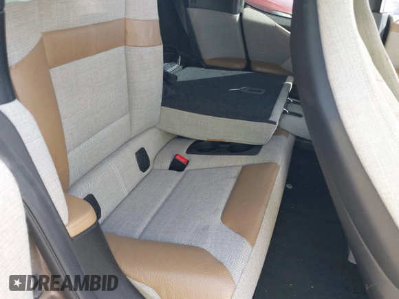 2015 BMW i3 z VIN WBY1Z2C51FV286397, wystawiony jako IAAI lot #41729019 z przebiegiem Nie podano mil oraz . Historia ofert i sprzedaży dostępna na DreamBid. Obrazek 8.