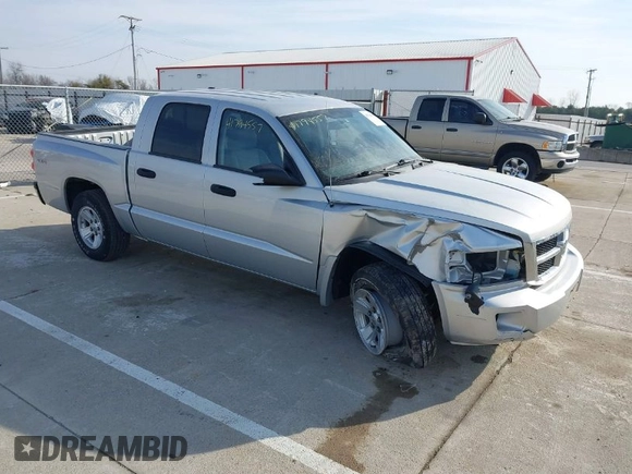 2008 Dodge Dakota SLT with VIN 1D7HW48N08S626761, listed as a IAAI auction lot 41794557 with 104,195 mi miles and . Bid and sale history available at DreamBid. Image 1.