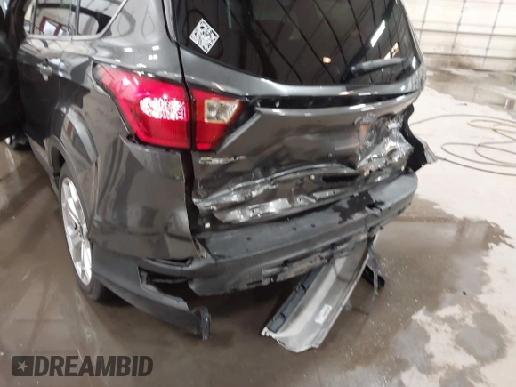 2019 Ford Escape Titanium with VIN 1FMCU9J91KUB11957, listed as a IAAI auction lot 41928264 with 72,460 mi miles. Bid and sale history available at carsss.com. Image 18.