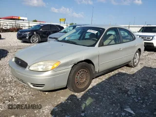2005 Ford Taurus SE with VIN 1FAFP53U95A101336, listed as a Copart auction lot 56457095 with 127,656 mi miles and Salvage title. Bid and sale history available at DreamBid. Image 1.