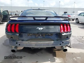 2018 Ford Mustang EcoBoost z VIN 1FA6P8TH0J5104312, wystawiony jako IAAI lot #42532806 z przebiegiem 87 564 mil mil oraz . Historia ofert i sprzedaży dostępna na DreamBid. Obrazek 17.