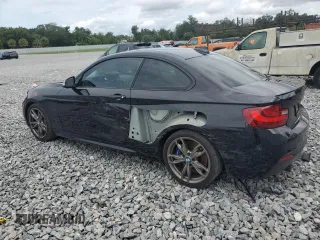2015 BMW 2 Series M235i with VIN WBA1J7C55FV289435, listed as a Copart auction lot 59089955 with 122,328 mi miles and Salvage title. Bid and sale history available at DreamBid. Image 2.