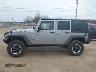 2015 Jeep Wrangler Unlimited Rubicon with VIN 1C4BJWFG1FL546018, listed as a IAAI auction lot 42060045 with 107,249 mi miles and . Bid and sale history available at DreamBid. Image 15.