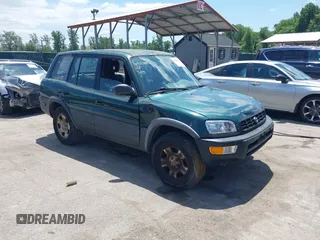 1998 Toyota RAV4 with VIN JT3GP10V6W0023680, listed as a IAAI auction lot 42235877 with 244,446 mi miles and . Bid and sale history available at DreamBid. Image 1.