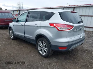 2013 Ford Escape SEL with VIN 1FMCU9H93DUD70670, listed as a IAAI auction lot 41867784 with 207,956 mi miles. Bid and sale history available at carsss.com. Image 3.