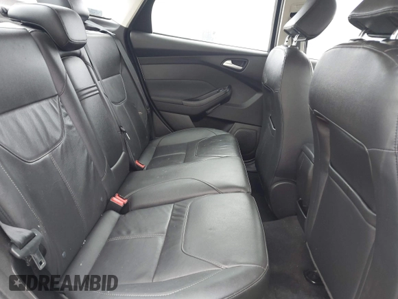 2015 Ford Focus SE with VIN 1FADP3F24FL347206, listed as a IAAI auction lot 41941987 with 96,473 mi miles and . Bid and sale history available at DreamBid. Image 8.