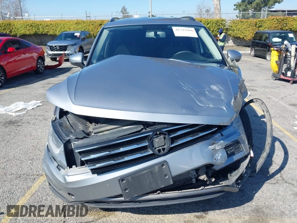 2021 Volkswagen Tiguan S with VIN 3VV1B7AX6MM131036, listed as a IAAI auction lot 41742604 with 55,155 mi miles and . Bid and sale history available at DreamBid. Image 13.