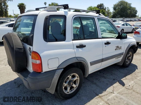 2001 Chevrolet Tracker ZR2 z VIN 2CNBJ734816935414, wystawiony jako Copart lot #54877235 z przebiegiem 117 483 mil mil oraz Szkoda całkowita • Salvage title. Historia ofert i sprzedaży dostępna na DreamBid. Obrazek 3.