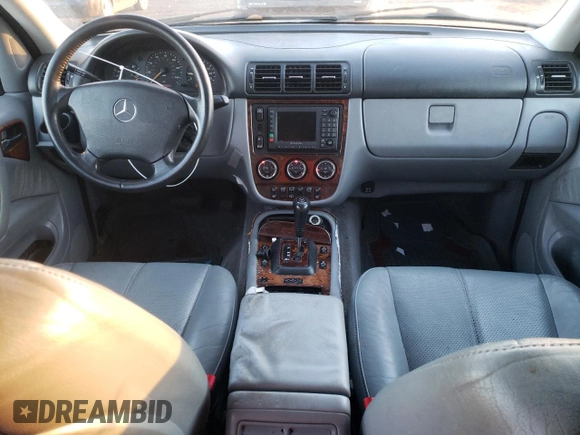 2002 Mercedes-Benz M-Class with VIN 4JGAB54E32A312131, listed as a Copart auction lot 80490084 with 165,365 mi miles and Salvage Title. Bid and sale history available at carsss.com. Image 8.