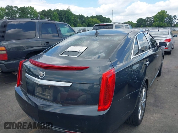 2013 Cadillac XTS Luxury с VIN 2G61P5S34D9183910, выставлен на аукционе IAAI как лот 42479531 с пробегом 160 798 миль миль и . История ставок и продаж доступна на DreamBid. Изображение 4.