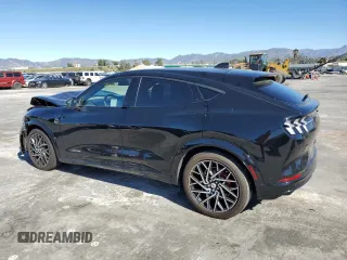 2021 Ford Mustang Mach-E GT z VIN 3FMTK4SX0MME01877, wystawiony jako Copart lot #40245063 z przebiegiem 26 657 mil mil oraz . Historia ofert i sprzedaży dostępna na DreamBid. Obrazek 2.