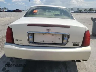 2004 Cadillac DeVille z VIN 1G6KD54Y44U226800, wystawiony jako Copart lot #61298895 z przebiegiem 108 211 mil mil oraz Szkoda całkowita • Salvage title. Historia ofert i sprzedaży dostępna na DreamBid. Obrazek 6.