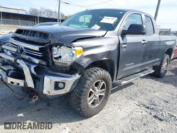 2016 Toyota Tundra 4WD Truck SR with VIN 5TFUW5F19GX548996, listed as a IAAI auction lot 41607605 with 101,194 mi miles. Bid and sale history available at carsss.com. Image 17.