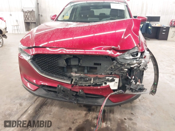 2018 Mazda CX-5 Grand Touring with VIN JM3KFBDM5J0414013, listed as a IAAI auction lot 42013479 with 88,225 mi miles and . Bid and sale history available at DreamBid. Image 6.