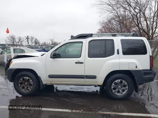 2014 Nissan Xterra X with VIN 5N1AN0NW4EN814113, listed as a IAAI auction lot 41969236 with 111,857 mi miles and . Bid and sale history available at DreamBid. Image 14.