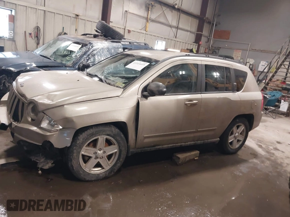 2010 Jeep Compass Sport with VIN 1J4NF4FB7AD501587, listed as a IAAI auction lot 41514419 with 154,826 mi miles. Bid and sale history available at carsss.com. Image 14.