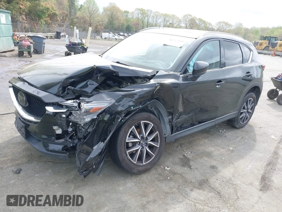 2018 Mazda CX-5 Grand Touring with VIN JM3KFBDM1J0358197, listed as a IAAI auction lot 41967940 with 148,119 mi miles and . Bid and sale history available at DreamBid. Image 17.