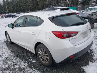 2016 Mazda Mazda3 i Grand Touring with VIN 3MZBM1N77GM319103, listed as a IAAI auction lot 41472772 with 82,833 mi miles. Bid and sale history available at carsss.com. Image 3.