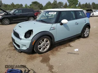 2013 MINI Hardtop S with VIN WMWSV3C52DT396033, listed as a Copart auction lot 61041585 with 83,873 mi miles and Salvage title. Bid and sale history available at DreamBid. Image 1.