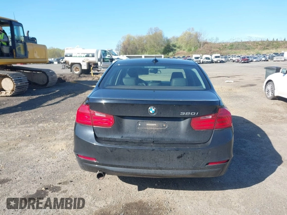 2015 BMW 3 Series 320i with VIN WBA3B1G55FNT04870, listed as a IAAI auction lot 42141211 with 249,720 mi miles. Bid and sale history available at carsss.com. Image 16.