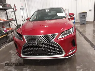 2022 Lexus RX with VIN 2T2JZMDA8NC358766, listed as a IAAI auction lot 41657650 with 17,716 mi miles. Bid and sale history available at carsss.com. Image 12.