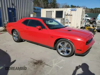 2013 Dodge Challenger R/T with VIN 2C3CDYBTXDH728695, listed as a Copart auction lot 42777345 with 140,696 mi miles and Salvage Title. Bid and sale history available at carsss.com. Image 4.