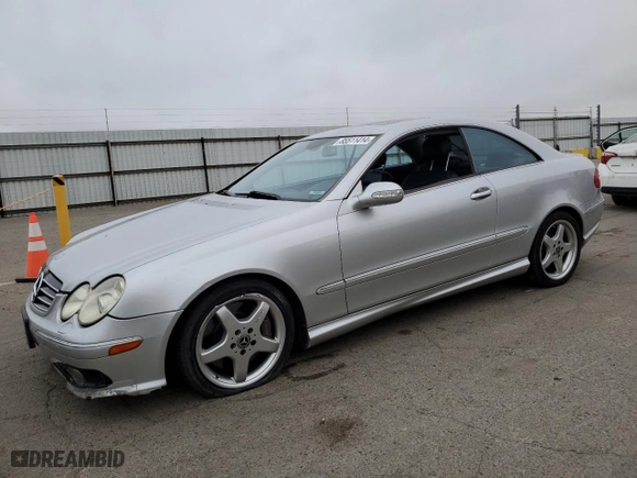 2004 Mercedes-Benz CLK-Class 5.0L with VIN WDBTJ75J04F110990, listed as a Copart auction lot 85511414 with 251,096 mi miles and Salvage Title. Bid and sale history available at carsss.com. Image 1.