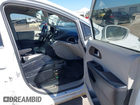 2018 Chrysler Pacifica Touring L with VIN 2C4RC1BG1JR119682, listed as a IAAI auction lot 41762362 with 167,380 mi miles and . Bid and sale history available at DreamBid. Image 5.