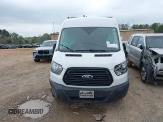 2019 Ford Transit z VIN 1FTYR2CM8KKA13993, wystawiony jako IAAI lot #41955116 z przebiegiem 91 395 mil mil oraz . Historia ofert i sprzedaży dostępna na DreamBid. Obrazek 12.