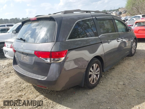 2016 Honda Odyssey EX-L with VIN 5FNRL5H61GB128957, listed as a IAAI auction lot 41953181 with 136,386 mi miles and . Bid and sale history available at DreamBid. Image 4.