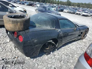 2000 Chevrolet Corvette with VIN 1G1YY22G6Y5116991, listed as a Copart auction lot 74272984 with 136,994 mi miles and Salvage Title. Bid and sale history available at carsss.com. Image 3.