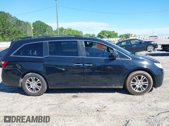 2011 Honda Odyssey EX-L with VIN 5FNRL5H67BB087064, listed as a IAAI auction lot 42326427 with 177,795 mi miles and . Bid and sale history available at DreamBid. Image 13.