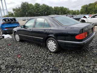 1999 Mercedes-Benz E-Class with VIN WDBJF65H4XA883351, listed as a Copart auction lot 73682964 with 156,446 mi miles and Salvage Title. Bid and sale history available at carsss.com. Image 2.